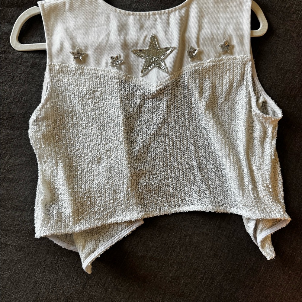White Sleeveless Top with Silver Star Embellishments vest.